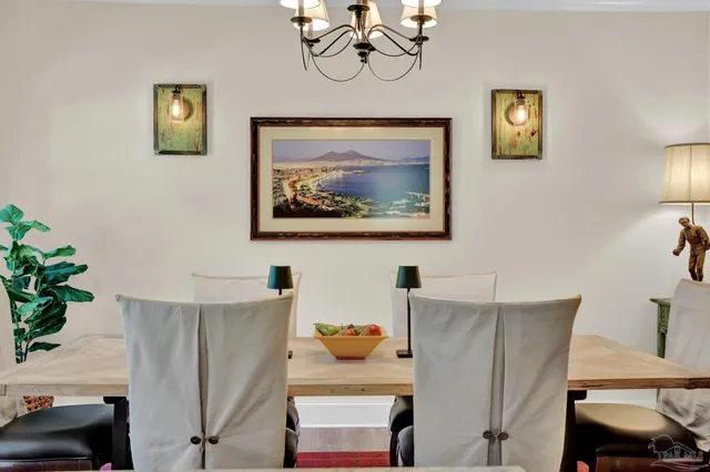 a bathroom with a granite countertop sink and mirror