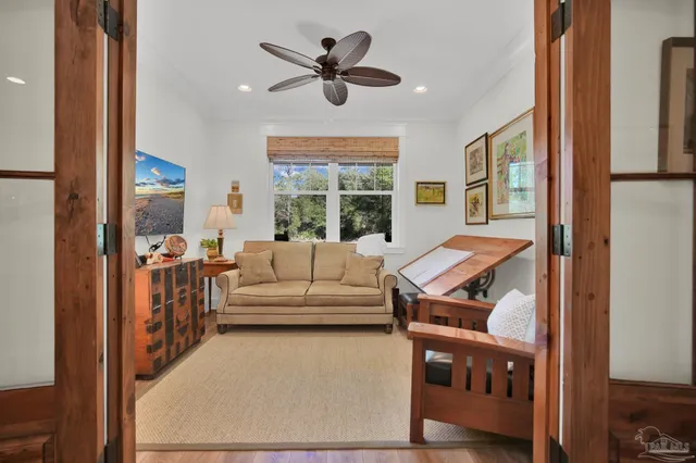 a white bath tub sitting next to a white toilet