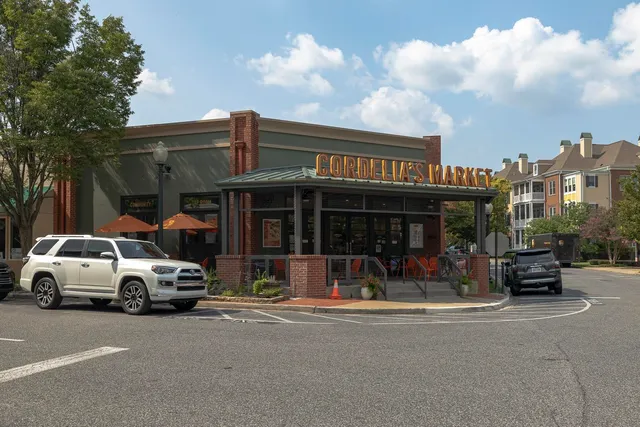 a view of a car park in front of house