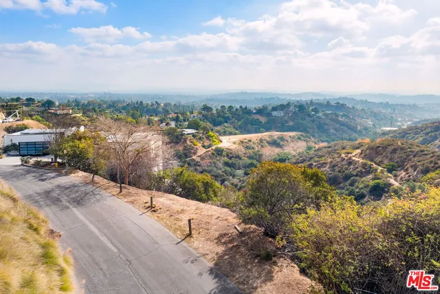 a view of a lake with mountain