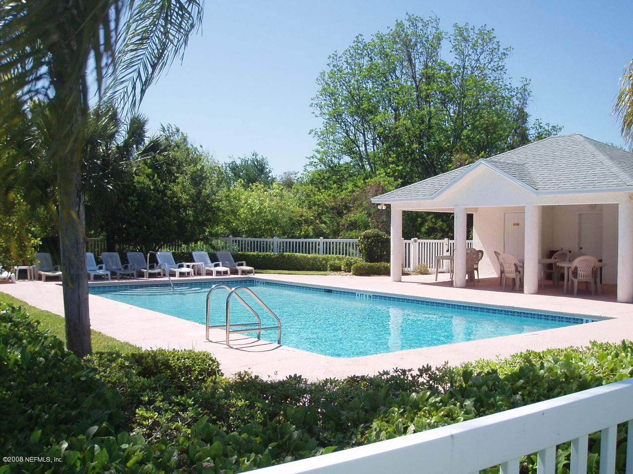 169 Cedar Ridge Circle St. Augustine, FL 32080 - Photo 4 of 5 a view of a house with swimming pool and sitting area