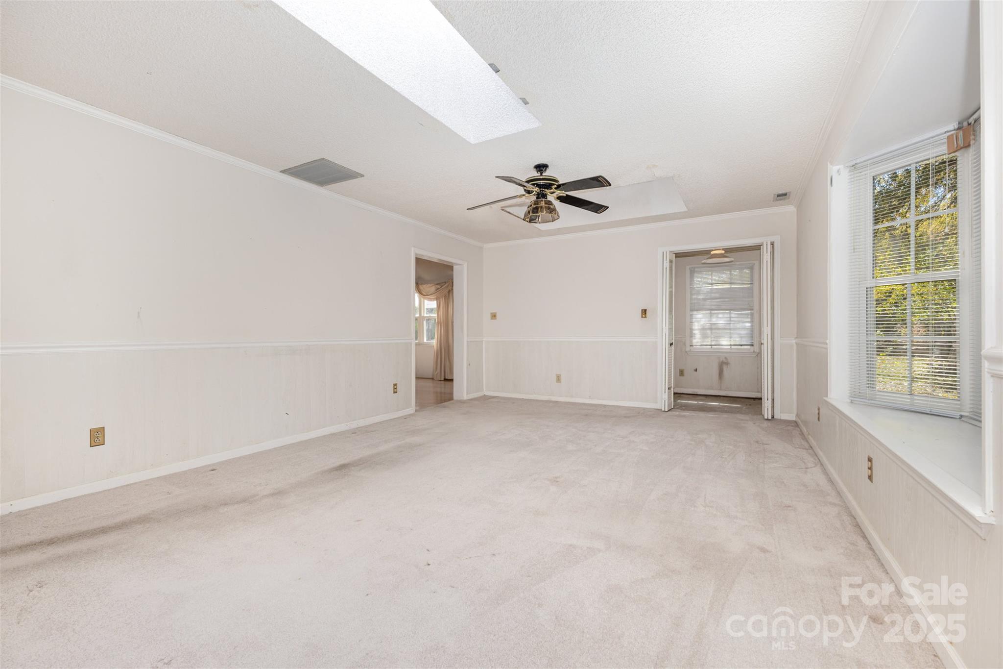 7428 Bradgate Road Charlotte, NC 28217 - Photo 11 of 27 a view of an empty room with a window