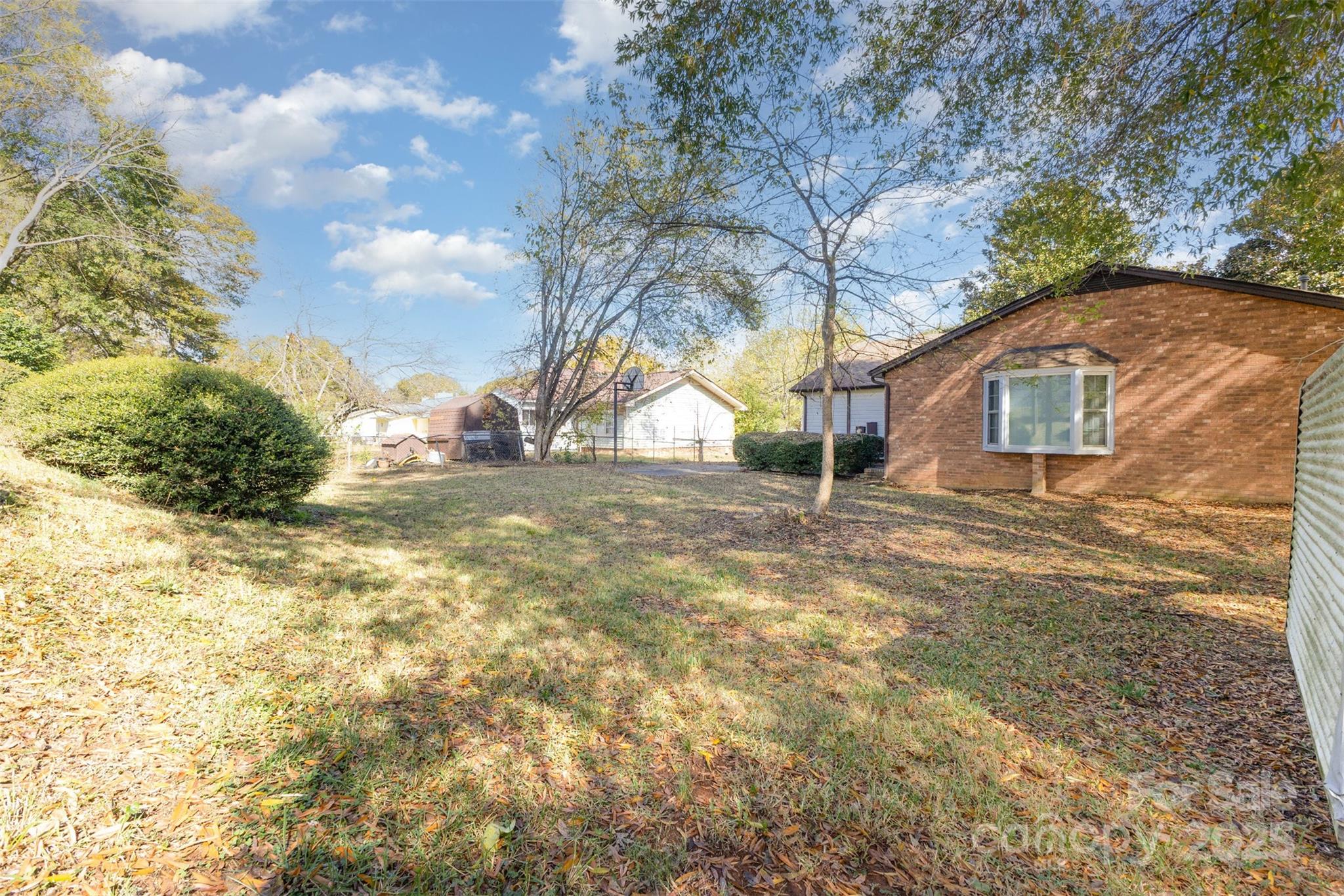 7428 Bradgate Road Charlotte, NC 28217 - Photo 25 of 27 a view of yard with large tree