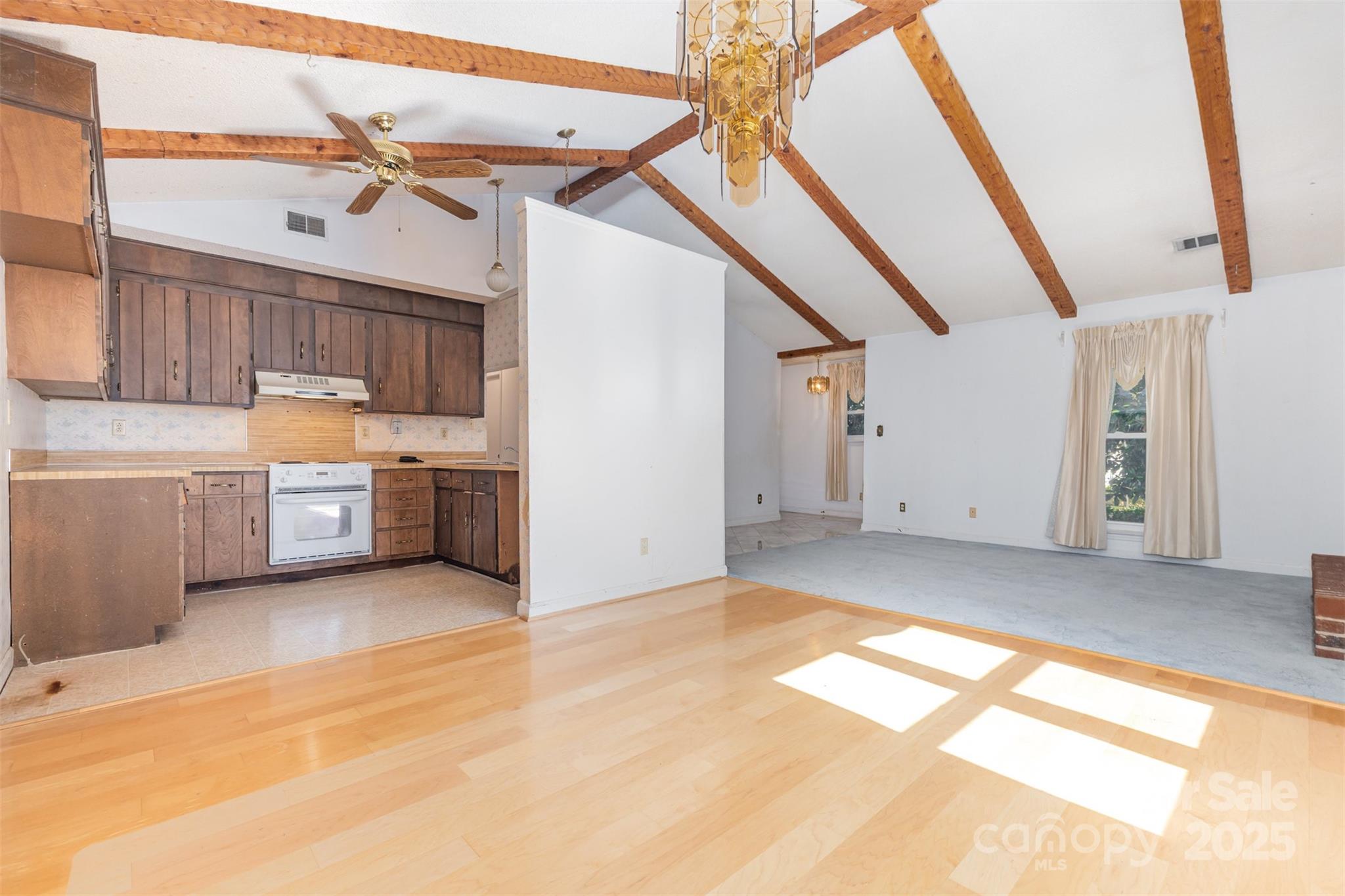 7428 Bradgate Road Charlotte, NC 28217 - Photo 4 of 27 a view of a kitchen with furniture and a kitchen