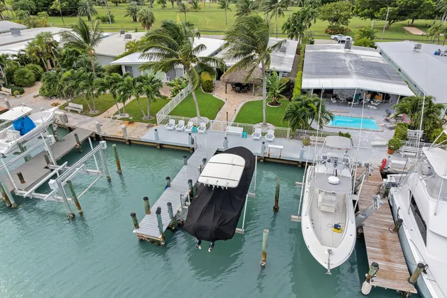 an aerial view of a house with outdoor space