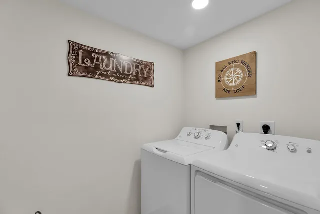 a view of a house with backyard and porch