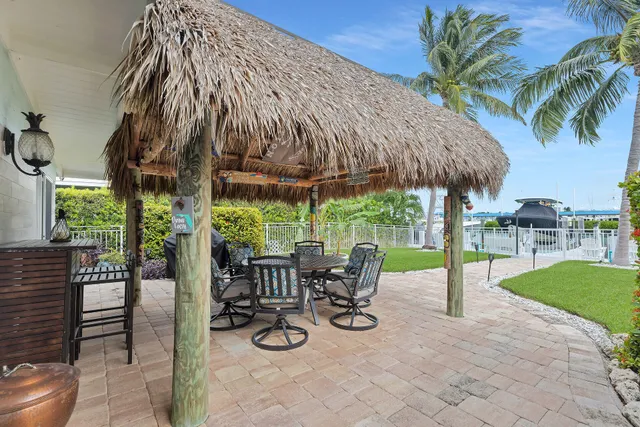 an aerial view of a house with a swimming pool