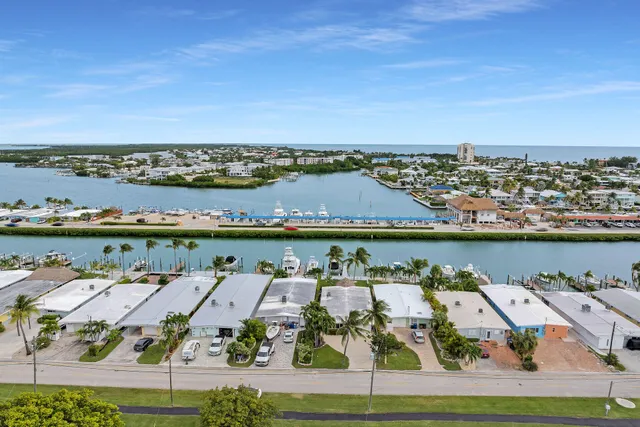 an aerial view of a house with outdoor space