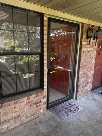 a window and a glass door in front of a glass door