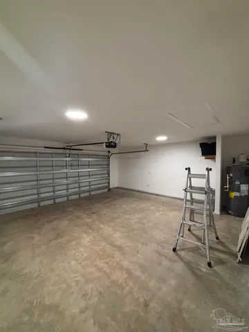 a view of an house with backyard space and garden