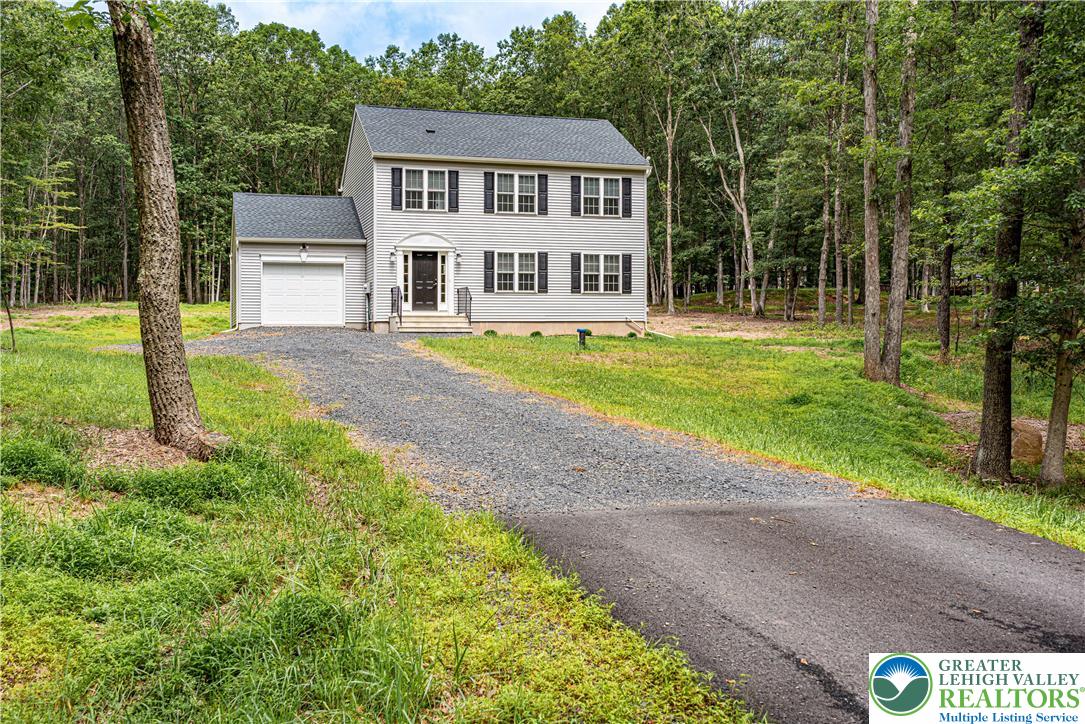 117 Cress Drive Effort, PA 18330 - Photo 1 of 29 a view of a house with a big yard and large tree