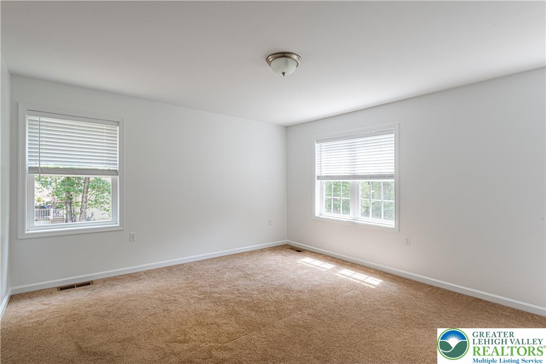 117 Cress Drive Effort, PA 18330 - Photo 17 of 29 an empty room with windows
