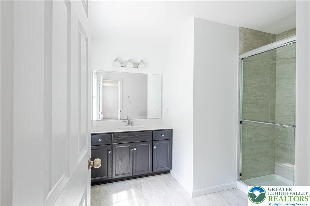 117 Cress Drive Effort, PA 18330 - Photo 19 of 29 a bathroom with a sink and a mirror