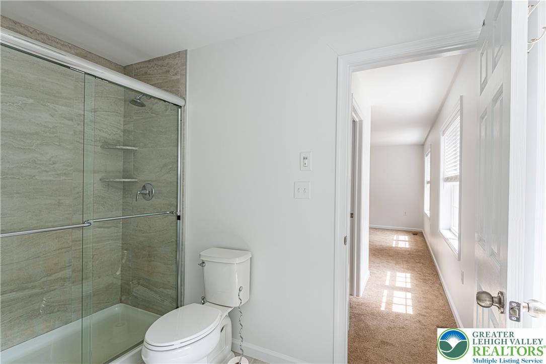 117 Cress Drive Effort, PA 18330 - Photo 20 of 29 a bathroom with a toilet and a shower