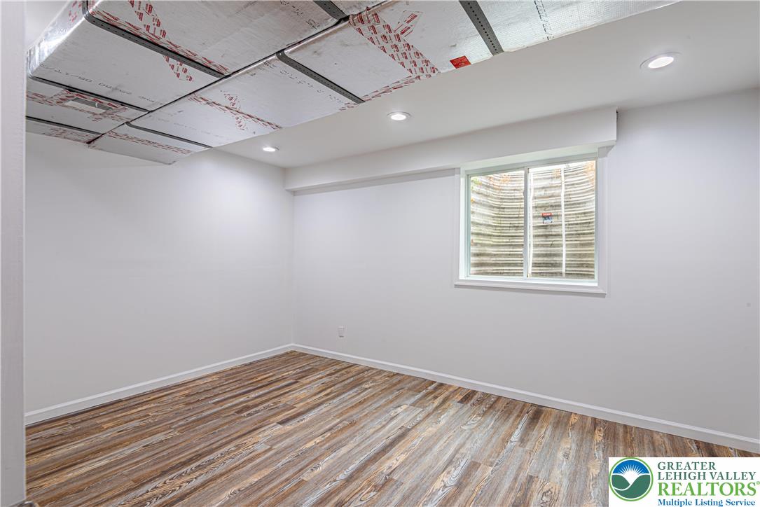 117 Cress Drive Effort, PA 18330 - Photo 23 of 29 a view of empty room with wooden floor and fan