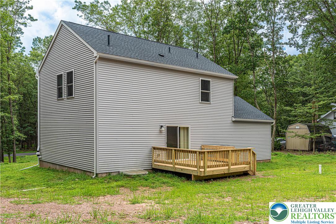 117 Cress Drive Effort, PA 18330 - Photo 25 of 29 a view of a house with a yard