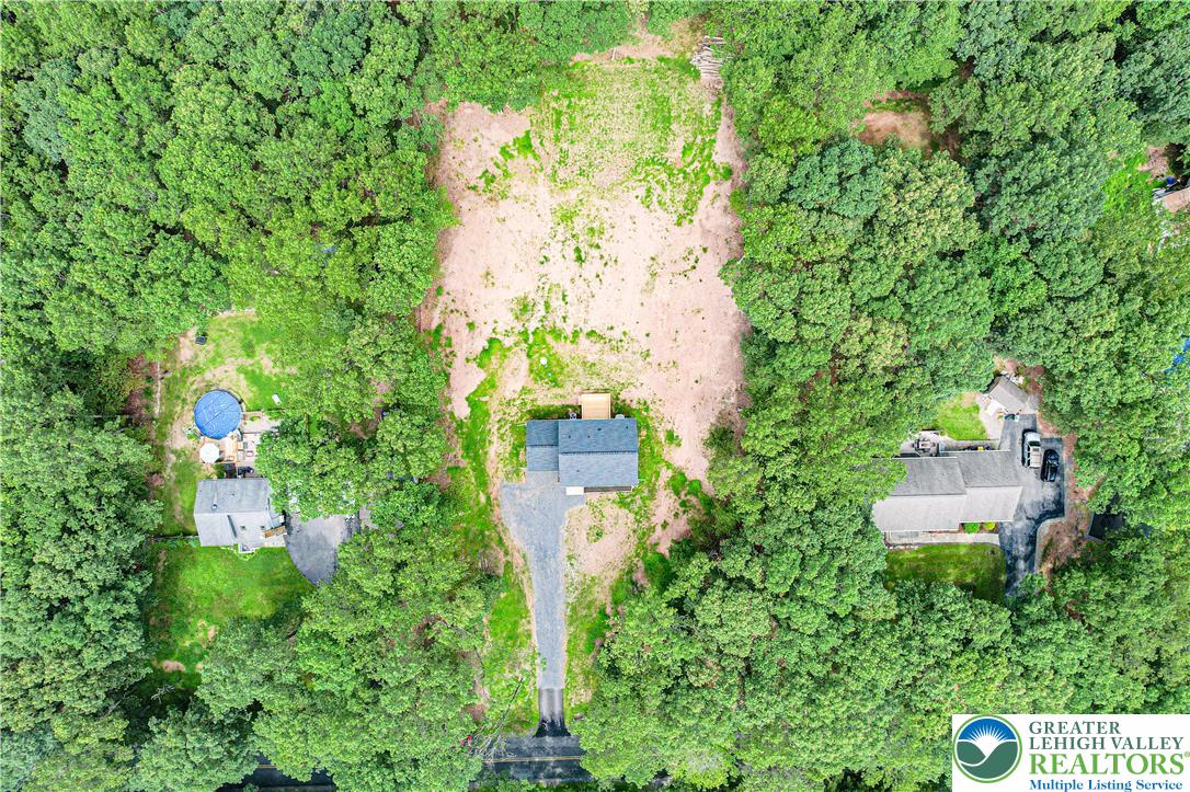 117 Cress Drive Effort, PA 18330 - Photo 27 of 29 an aerial view of residential house with outdoor space and trees all around