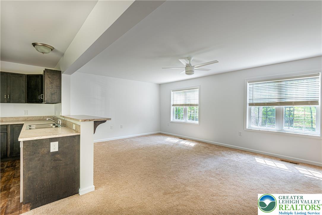 117 Cress Drive Effort, PA 18330 - Photo 6 of 29 a view of livingroom with washer and dryer