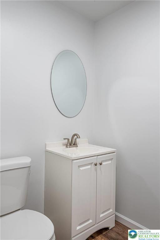 117 Cress Drive Effort, PA 18330 - Photo 10 of 29 a bathroom with a toilet a sink and mirror