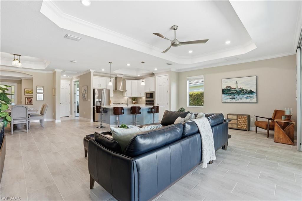 15194 Blue Bay Circle Fort Myers, FL 33913 - Photo 11 of 50 a living room with furniture and a large window