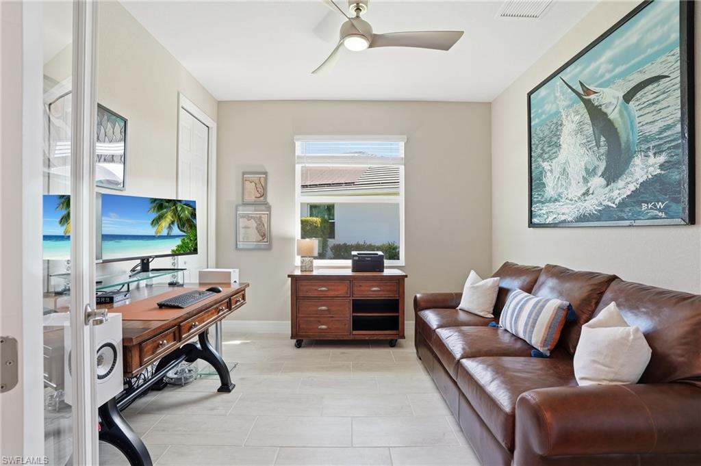 15194 Blue Bay Circle Fort Myers, FL 33913 - Photo 32 of 50 a living room with furniture and a window