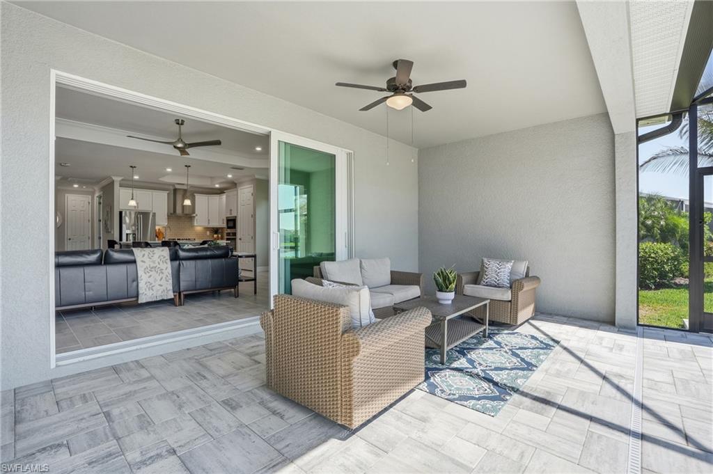 15194 Blue Bay Circle Fort Myers, FL 33913 - Photo 34 of 50 a living room with furniture and a rug