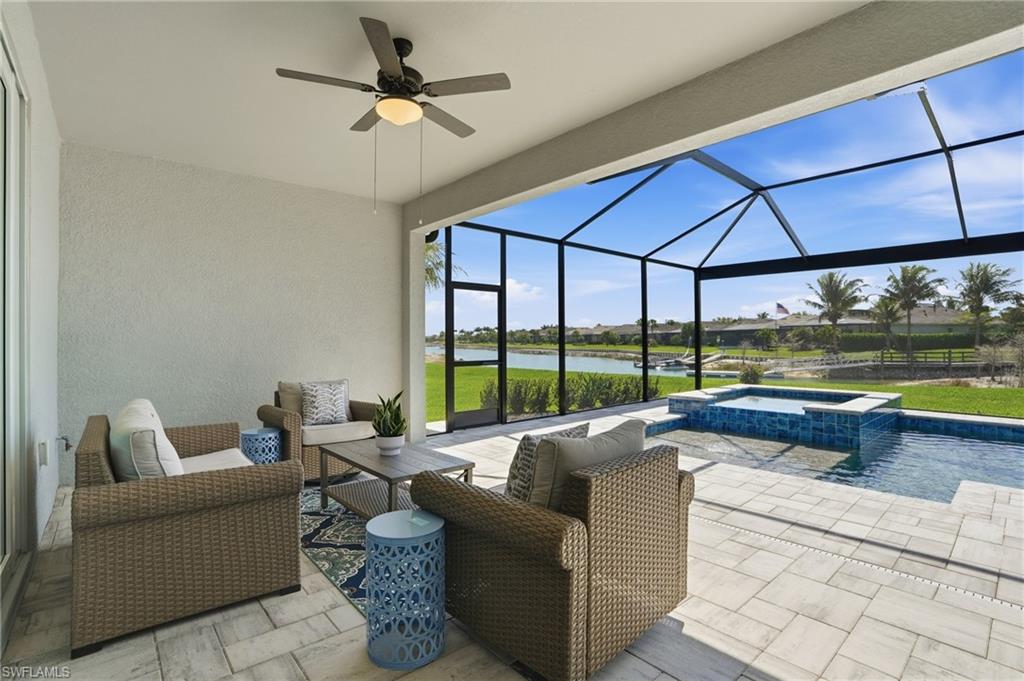 15194 Blue Bay Circle Fort Myers, FL 33913 - Photo 35 of 50 a living room with furniture and a large window