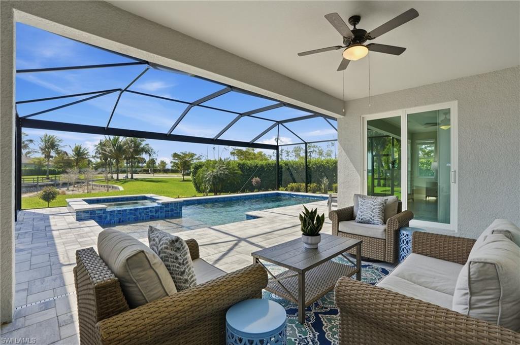15194 Blue Bay Circle Fort Myers, FL 33913 - Photo 36 of 50 a living room with furniture and a large window