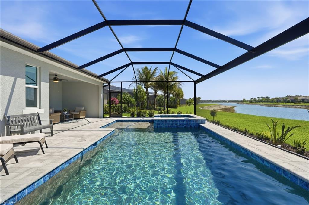 15194 Blue Bay Circle Fort Myers, FL 33913 - Photo 39 of 50 a view of swimming pool with a patio