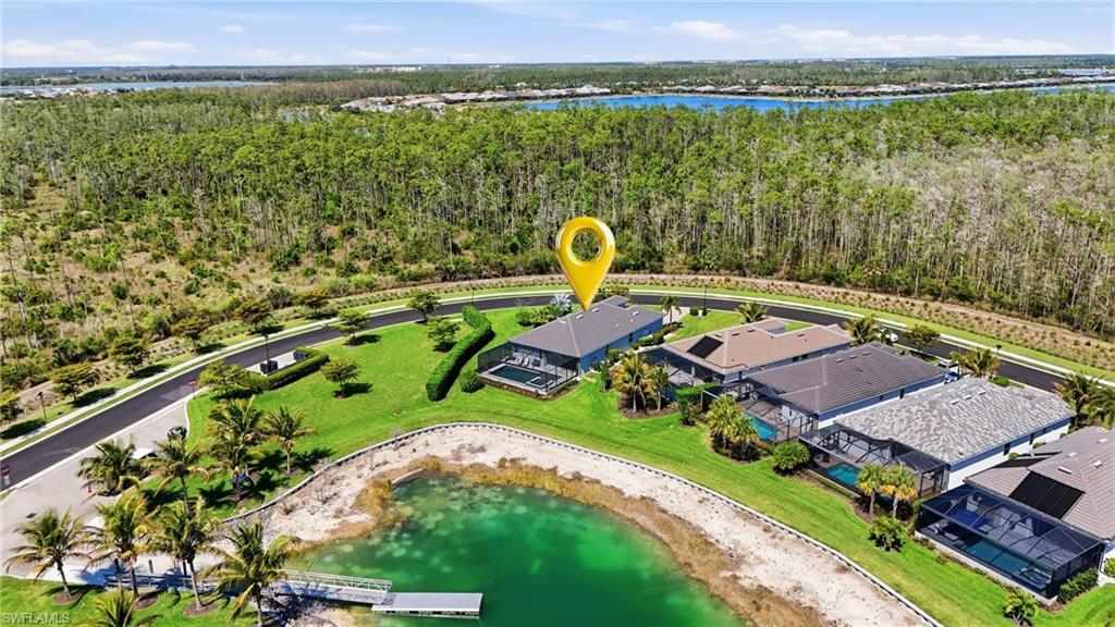 15194 Blue Bay Circle Fort Myers, FL 33913 - Photo 42 of 50 an aerial view of a house with a lake view