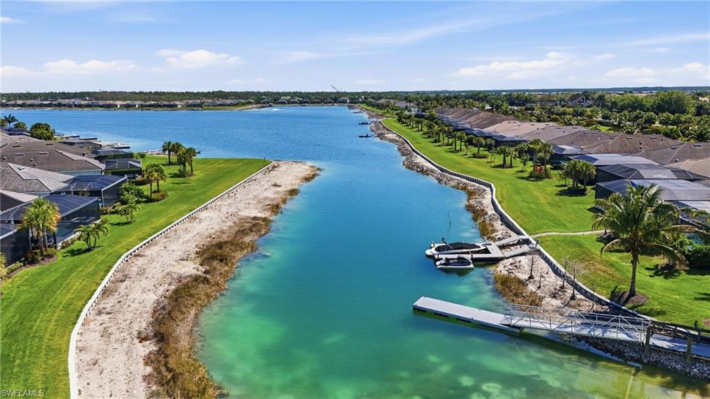 15194 Blue Bay Circle Fort Myers, FL 33913 - Photo 43 of 50 an aerial view of a house with a garden and lake view