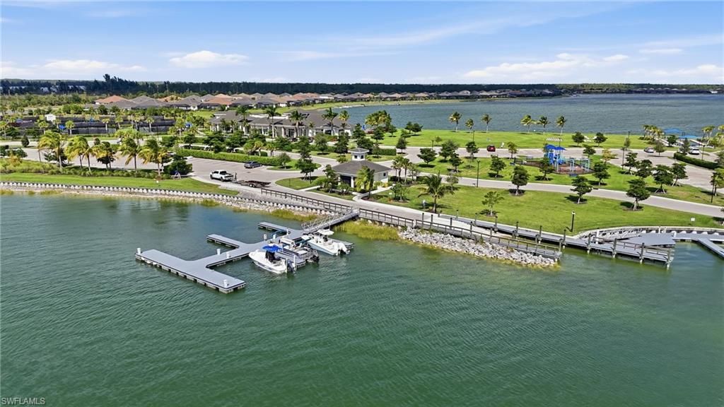 15194 Blue Bay Circle Fort Myers, FL 33913 - Photo 50 of 50 a view of a lake with a city