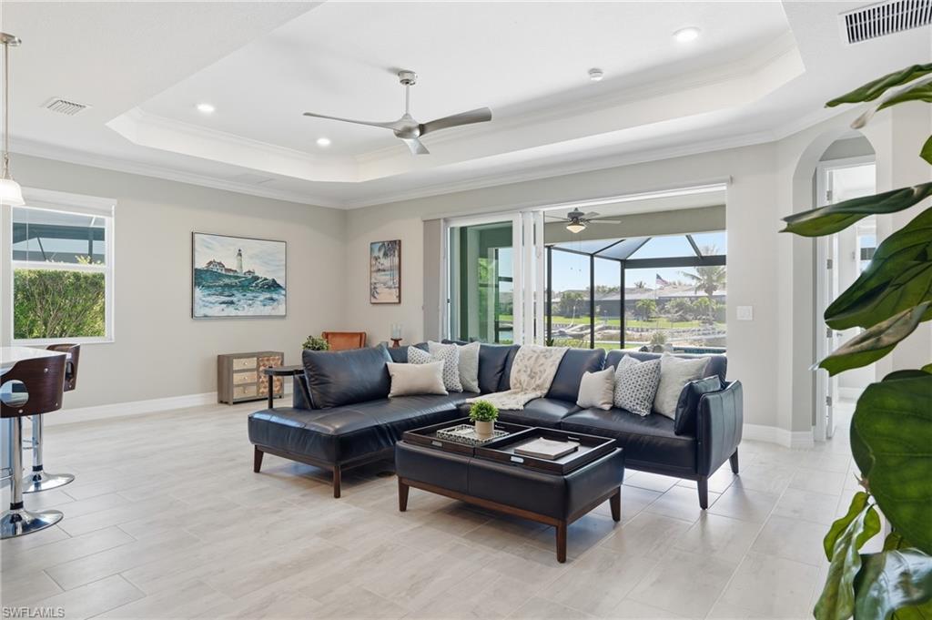 15194 Blue Bay Circle Fort Myers, FL 33913 - Photo 10 of 50 a living room with furniture and a large window