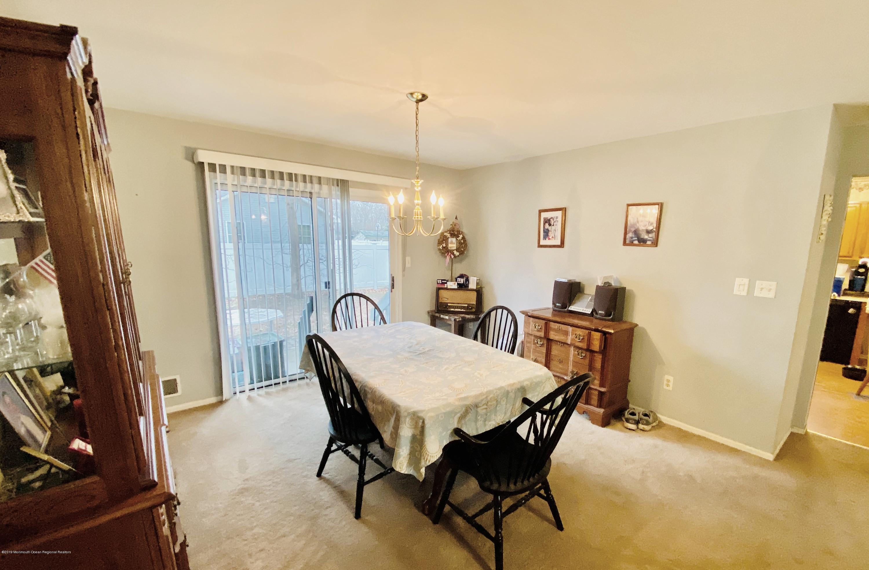47 Dockage Road Bayville, NJ 08721 - Photo 4 of 19 a view of a dining room with furniture and a window