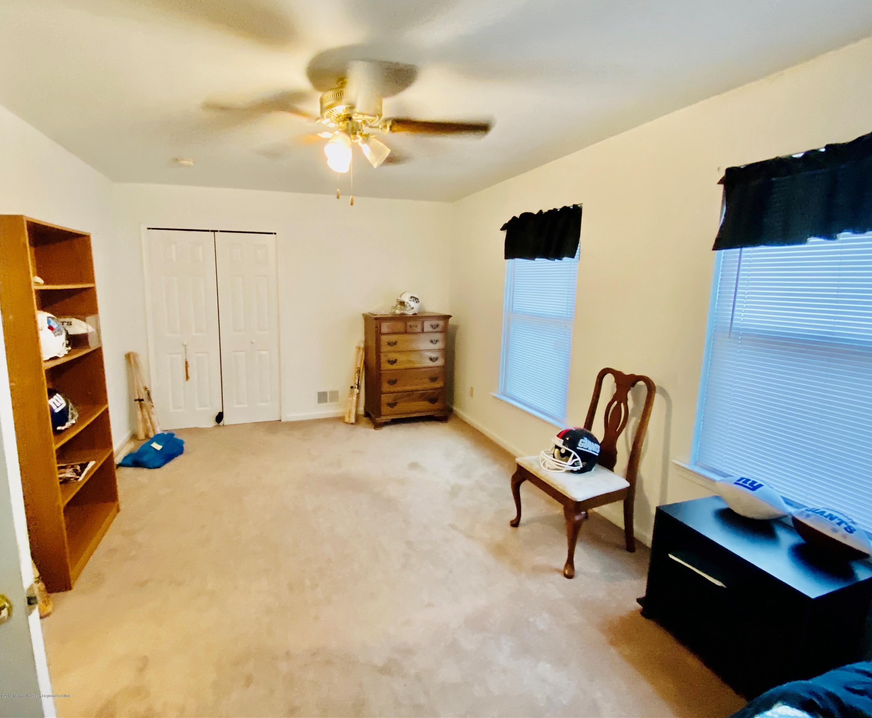 47 Dockage Road Bayville, NJ 08721 - Photo 8 of 19 a livingroom with furniture and a flat screen tv