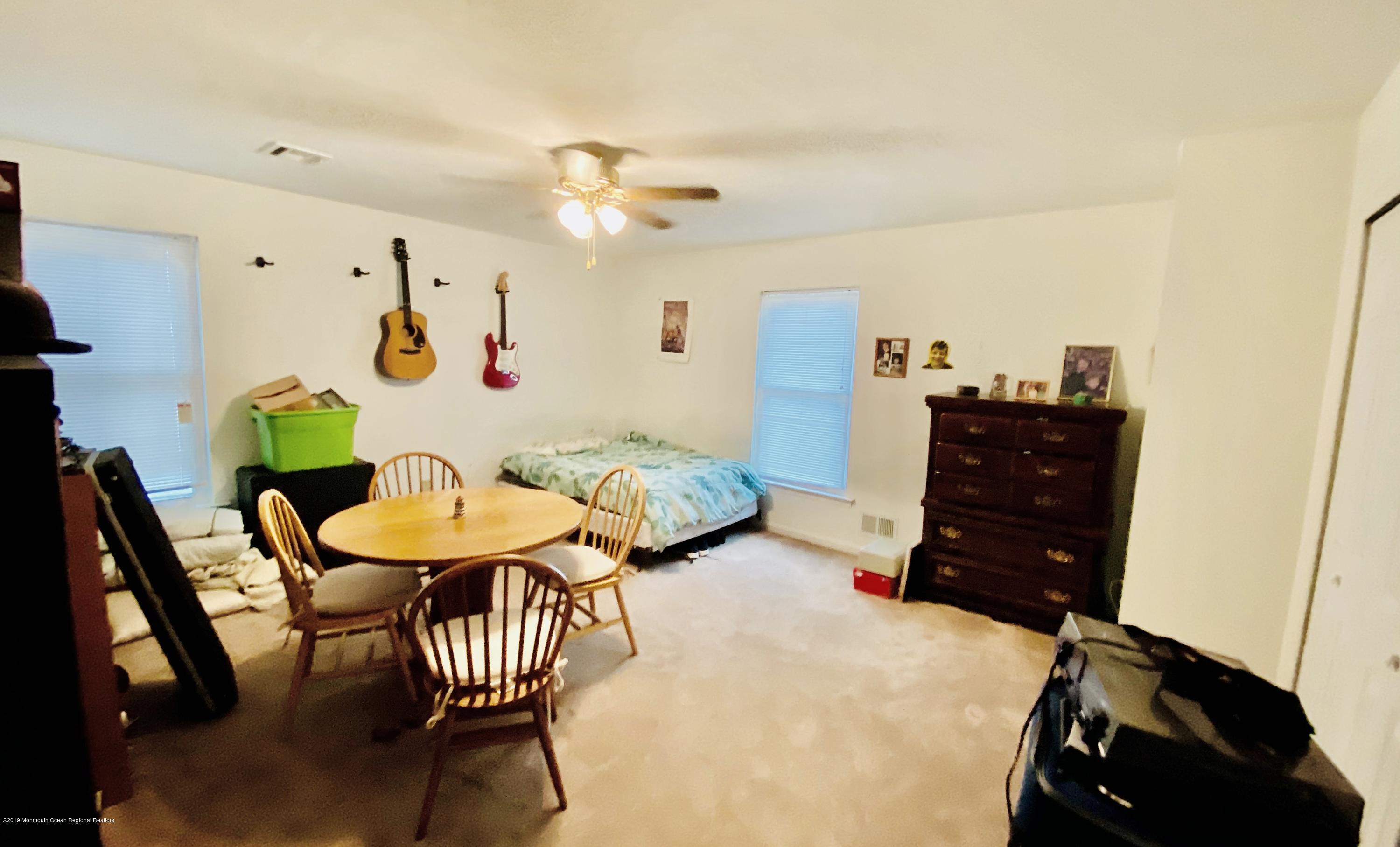 47 Dockage Road Bayville, NJ 08721 - Photo 10 of 19 a view of a dining room with furniture