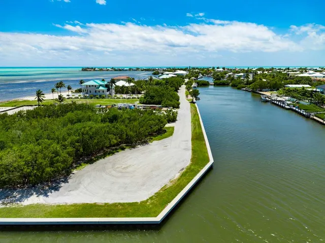 a view of a lake with a big yard