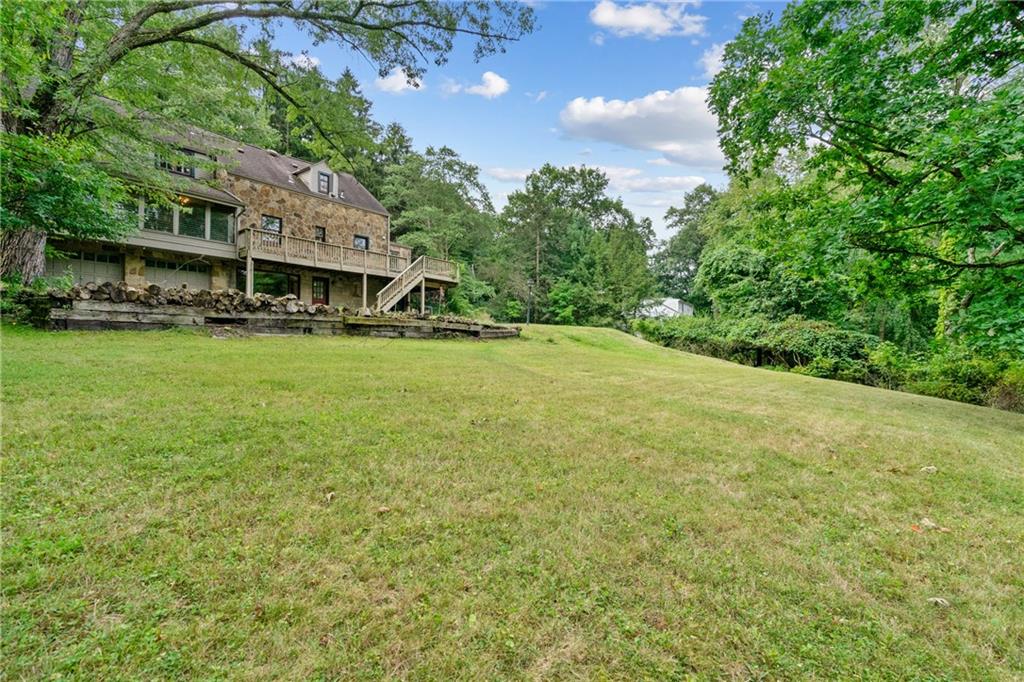 715 Old Mill Road Pittsburgh, PA 15238 - Photo 35 of 46 View of the rear of the house and gently sloping yard