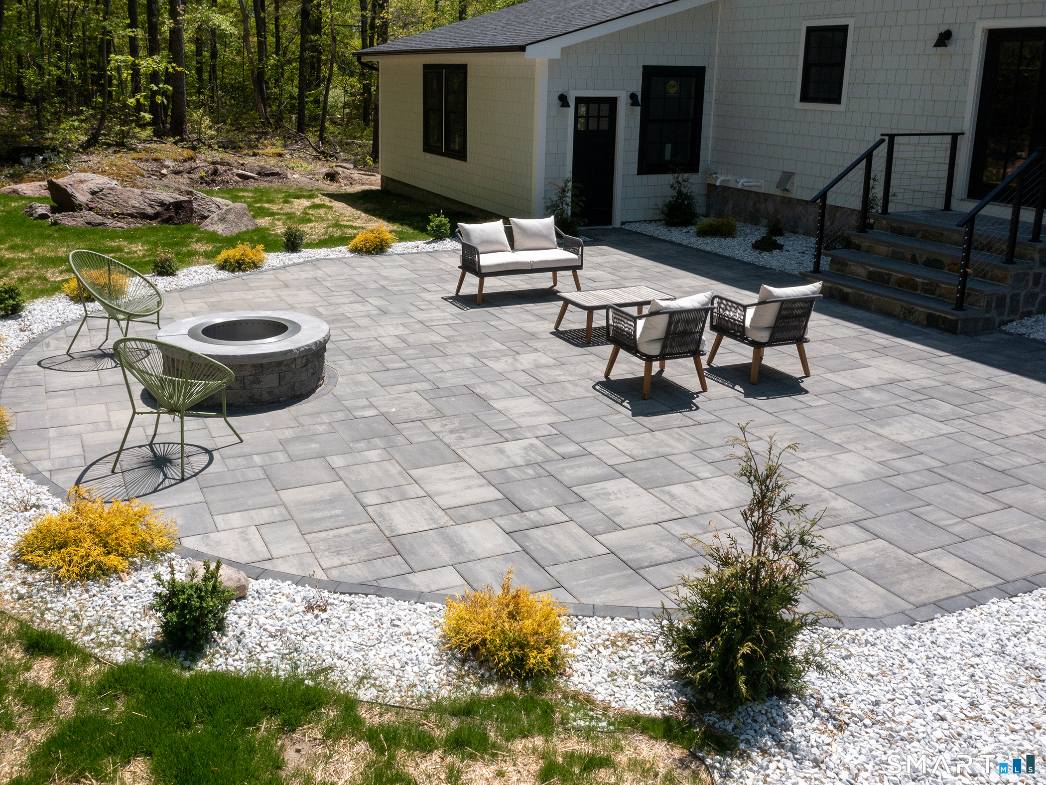 53 Mountain Lake Road Warren, CT 06777 - Photo 39 of 40 a view of a swimming pool with a lounge chairs