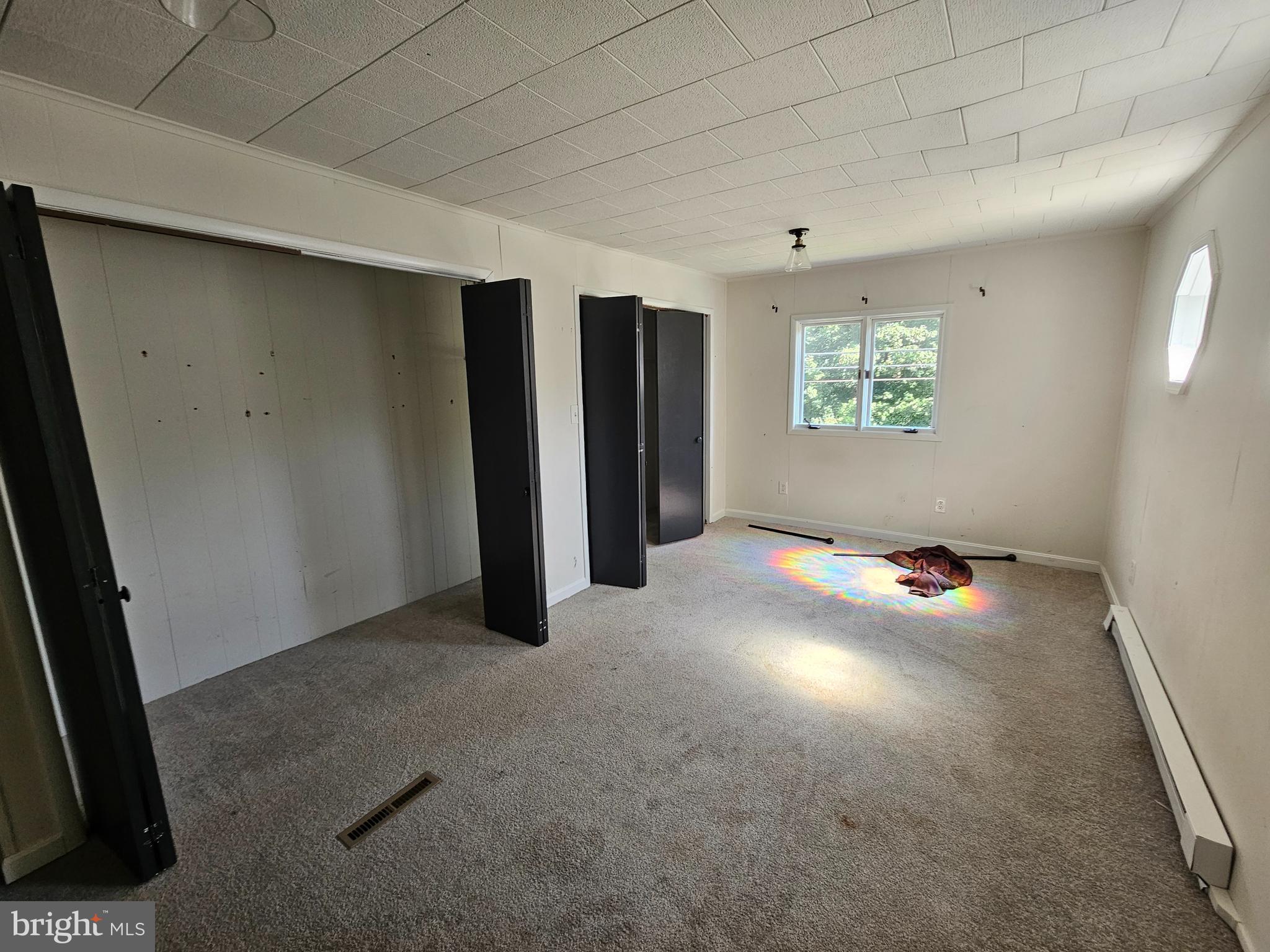 941 Conewago Creek Road Manchester, PA 17345 - Photo 21 of 22 an empty room with closet and windows