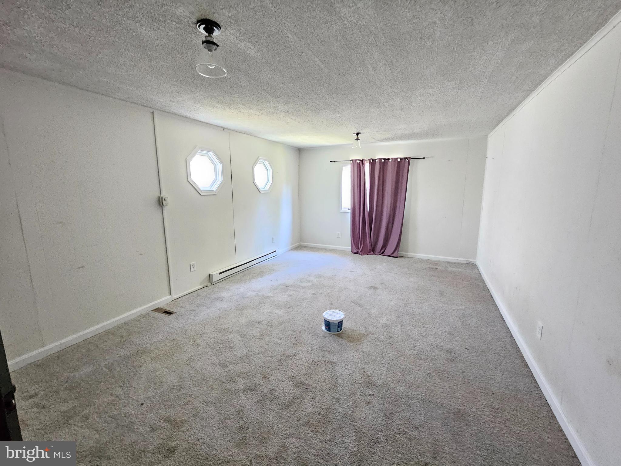 941 Conewago Creek Road Manchester, PA 17345 - Photo 9 of 22 an empty room with windows and closet