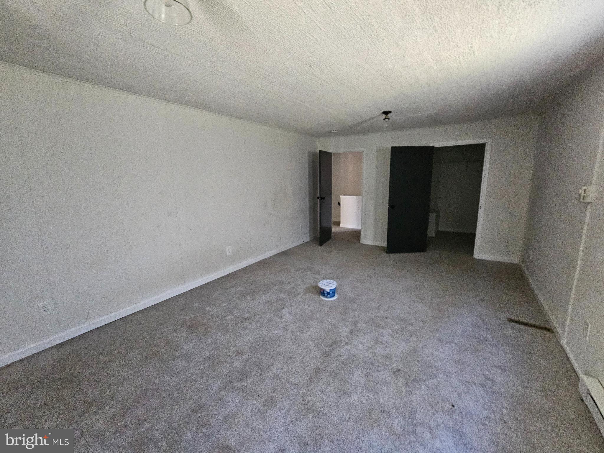 941 Conewago Creek Road Manchester, PA 17345 - Photo 10 of 22 wooden floor and window in an empty room