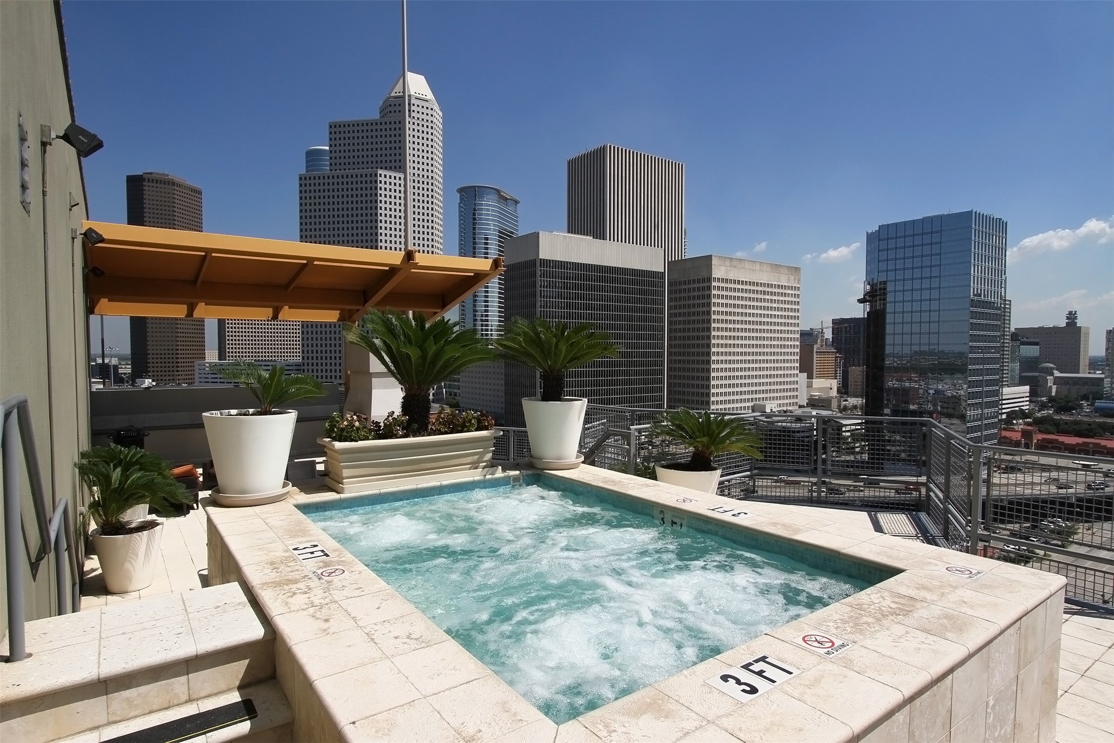 2000 Bagby Street, Unit 11415 Houston, TX 77002 - Photo 29 of 35 Unwind after a long day in the hot tub while taking in these amazing views.
