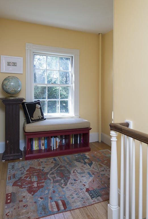 61 Sandy Pond Road Lincoln, MA 01773 - Photo 13 of 28 a front view of a house with a wooden floor and a large window