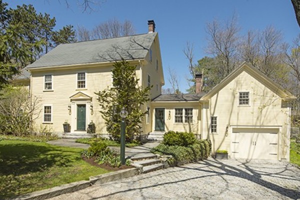 61 Sandy Pond Road Lincoln, MA 01773 - Photo 2 of 28 a view of a white house next to a yard