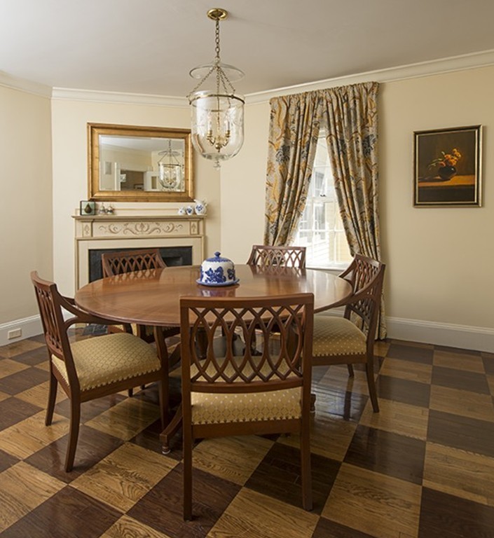 61 Sandy Pond Road Lincoln, MA 01773 - Photo 4 of 28 a view of a dining room with furniture and chandelier