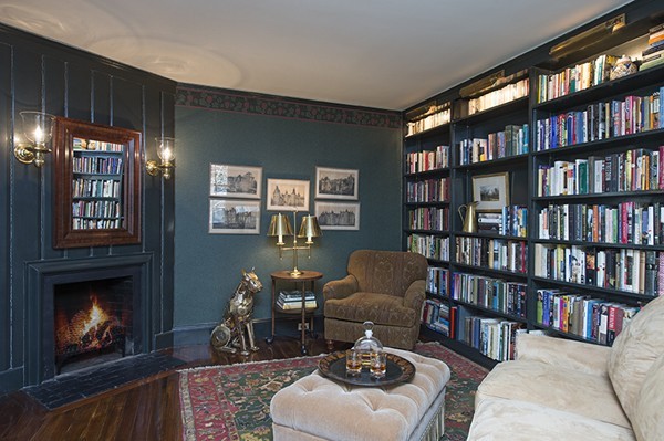61 Sandy Pond Road Lincoln, MA 01773 - Photo 6 of 28 a living room with furniture and a book shelf