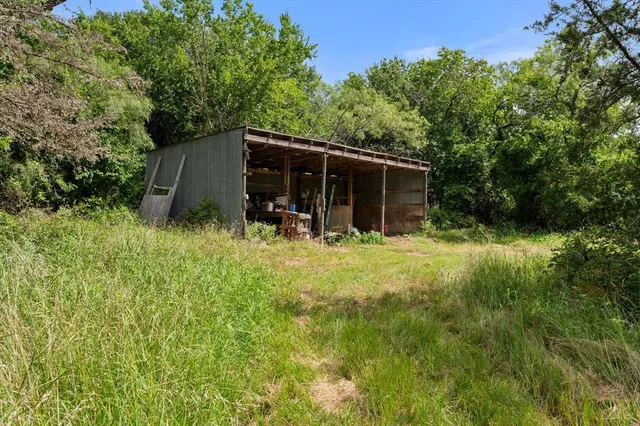 a view of outdoor space and yard