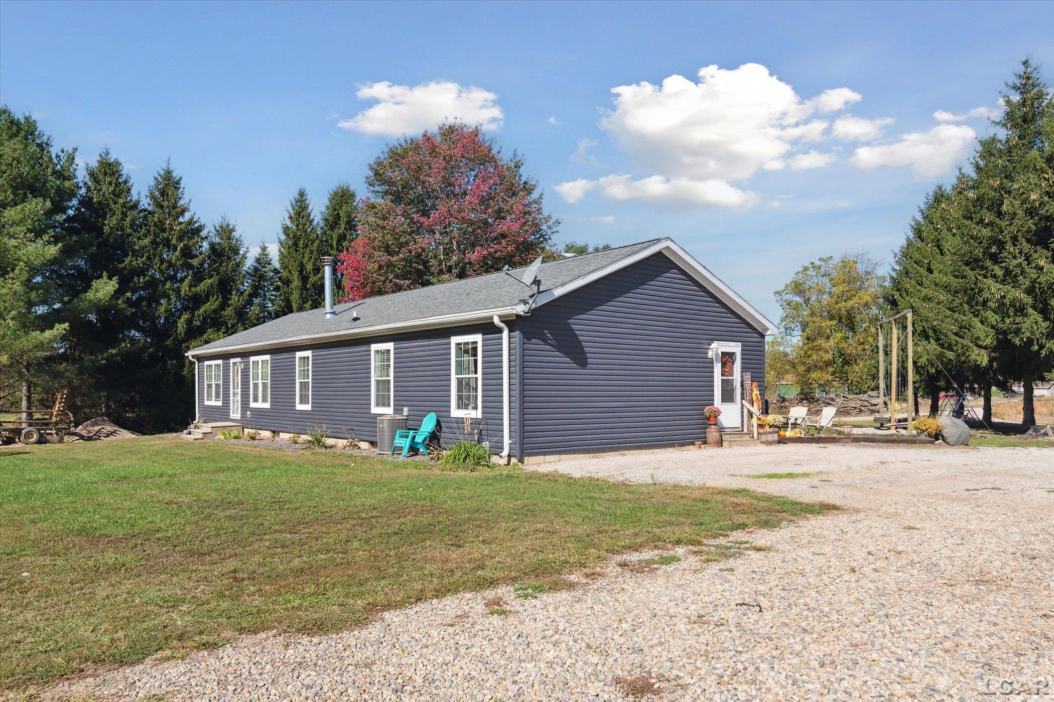 17141 Manitou Road Addison, MI 49220 - Photo 4 of 49 50157756-c2ff5951-6f35-4ee5-a758-302efcf647c0.JPG