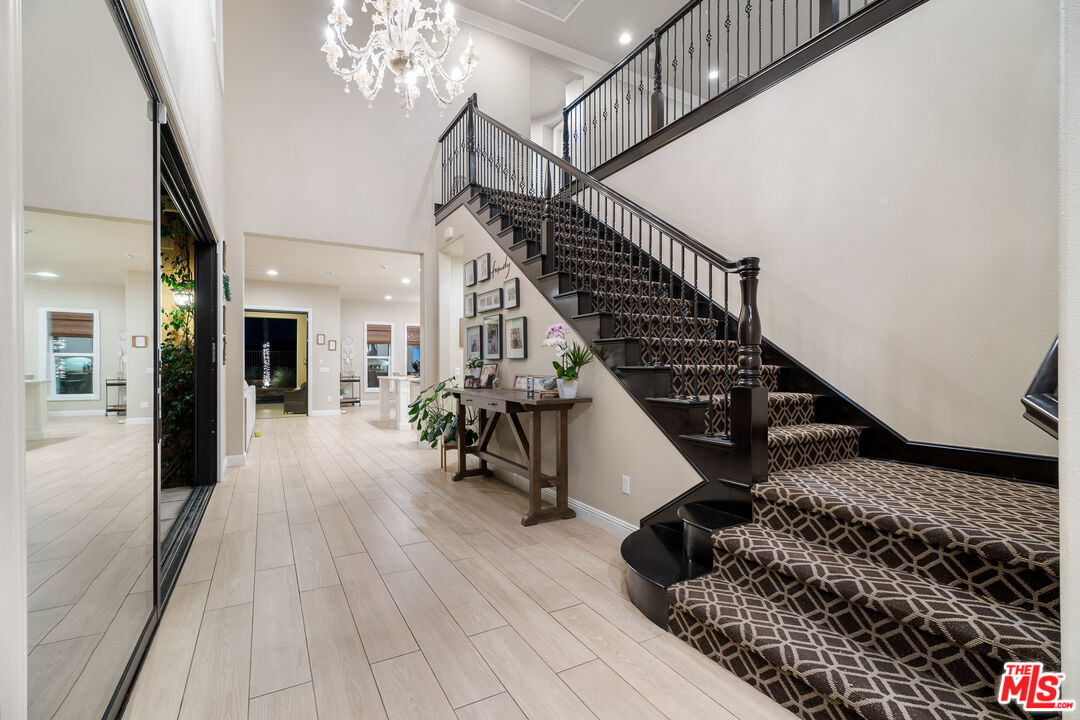 12015 North Ricasoli Way Porter Ranch, CA 91326 - Photo 11 of 68 a view of entryway and hall with wooden floor